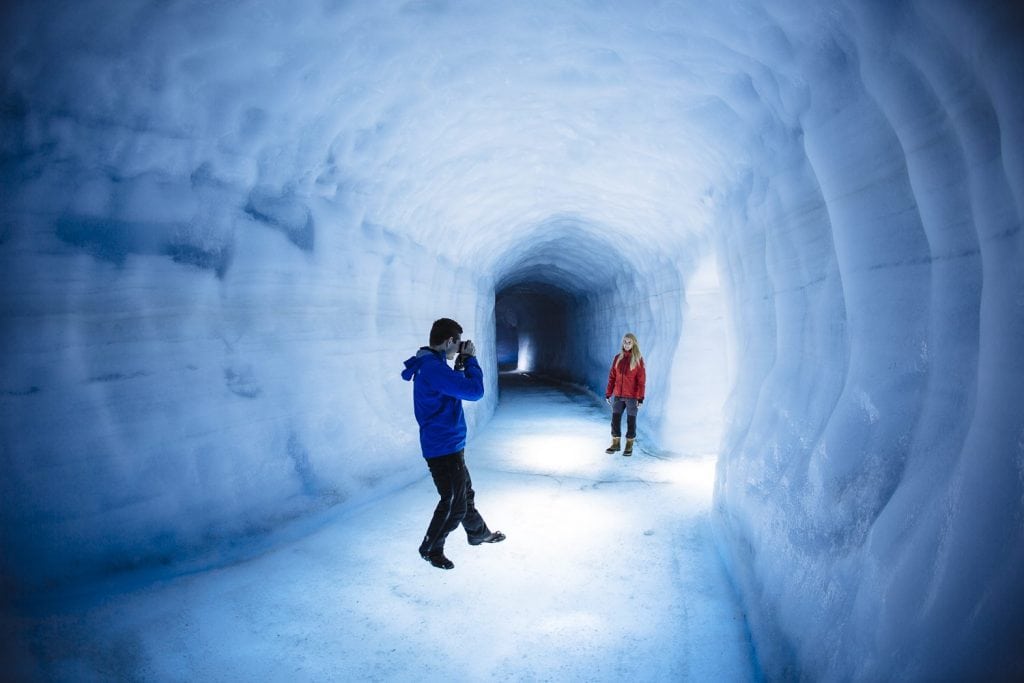 into the glacier ice tunnel