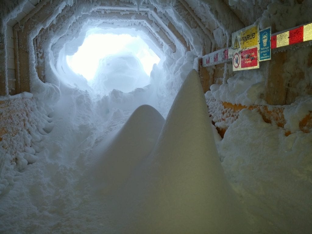 Snow in ice tunnel