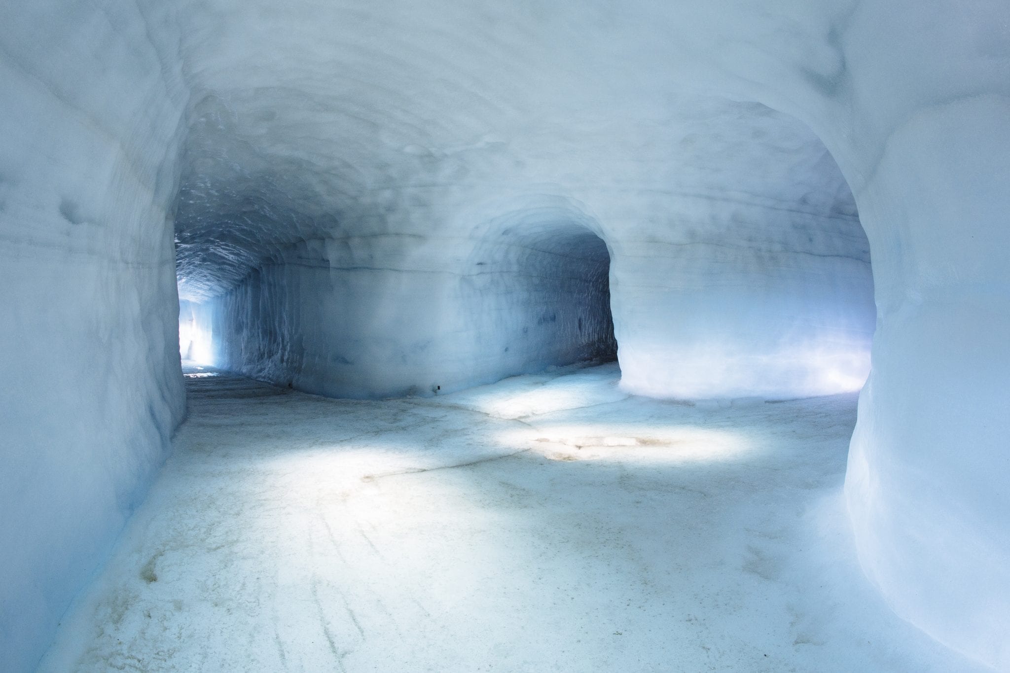 Into the glacier ice cave tunnel