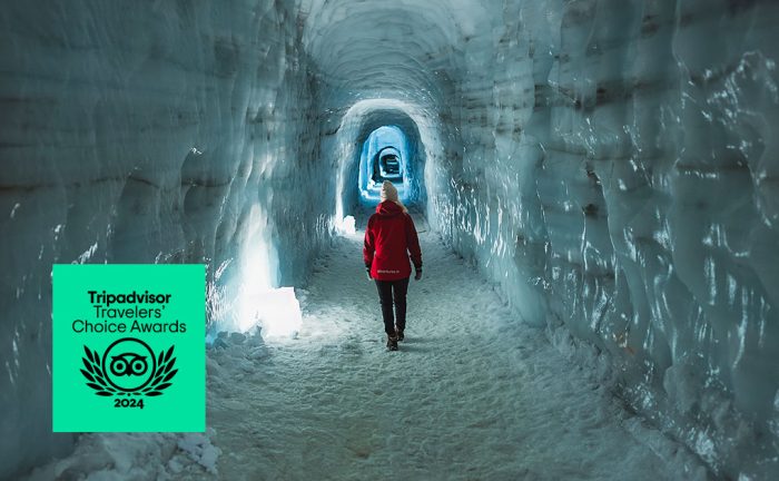 Woman in blue ice cave in Iceland